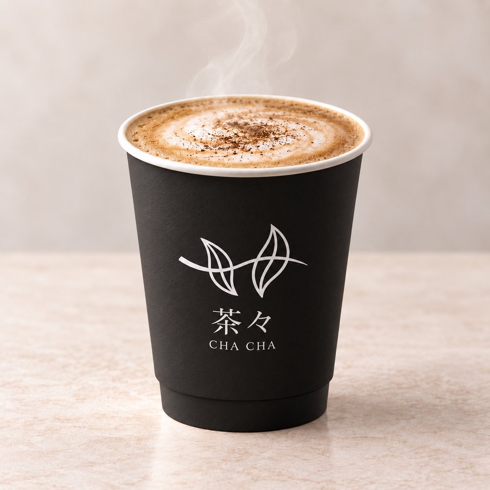 Hot hojicha latte in a black CHACHA cup